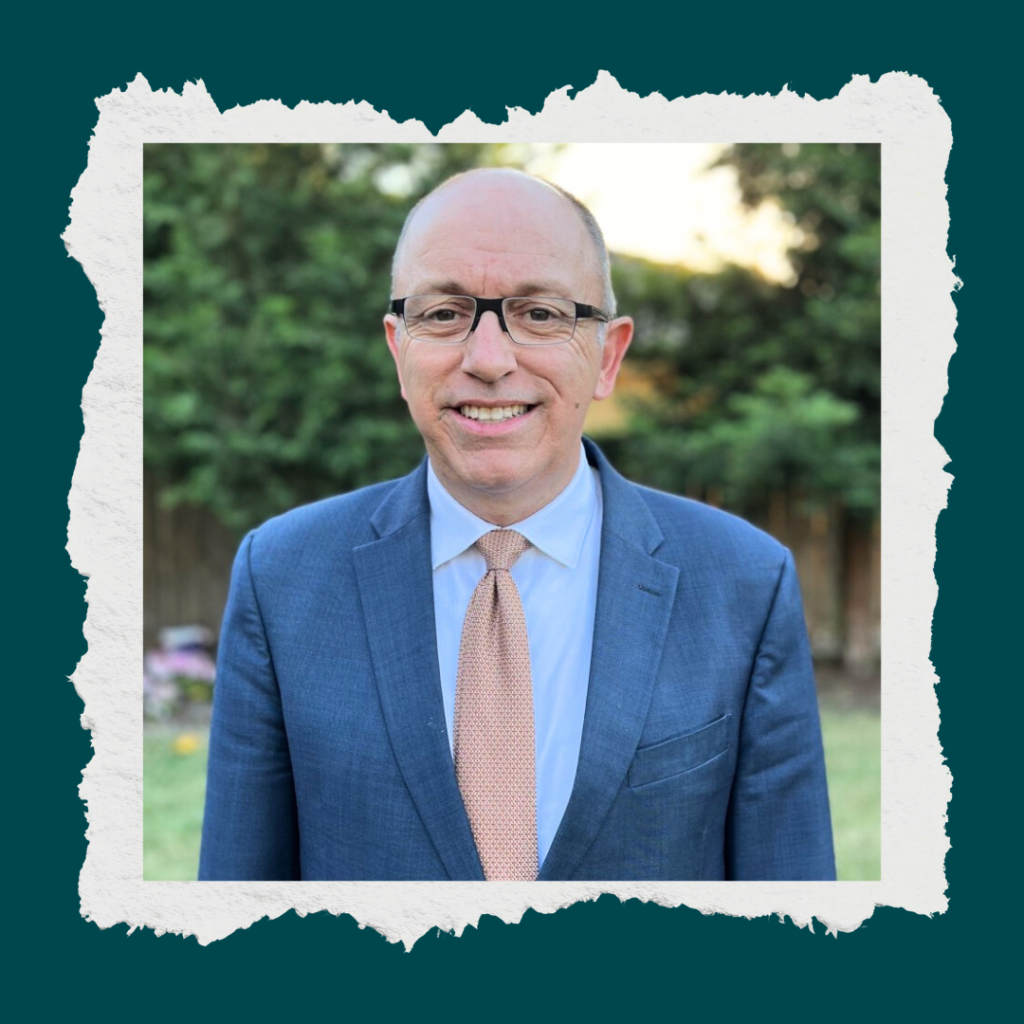 Photo of Brandon, conflict resolution book author, smiling in a professional setting